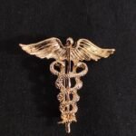 Brooch: G 3