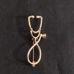 Brooch: G 1
