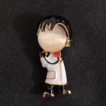 Brooch: M 1